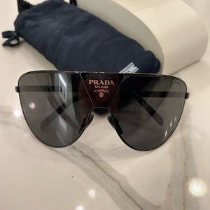 Prada sunglasses. Brand new never worn. Case included.